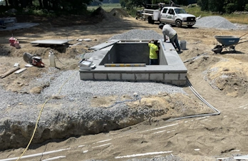Plunge pool installation with masonry construction in Concord, Massachusetts