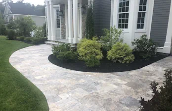 Custom natural stone walkway and garden path constructed by S. Phaneuf & Associates in Massachusetts.